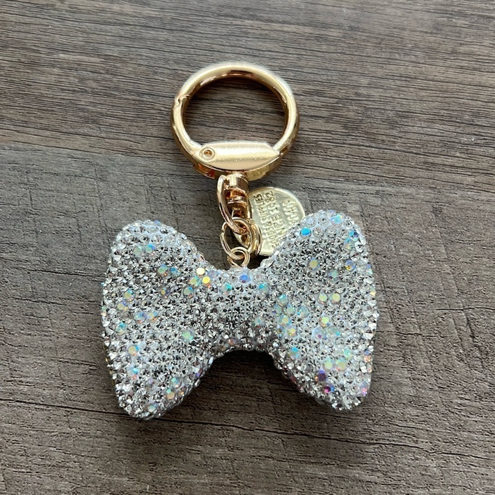 NWOT Crystal bling bow keychain - gold & silver